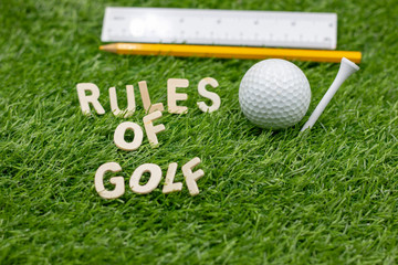 Rules of golf on green grass