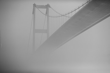 Fototapeta premium Image of modern bridge, cloudy sky .