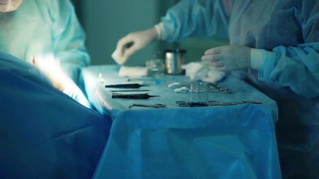 medical instruments surgeon on the background of plastic surgery in the operating room.