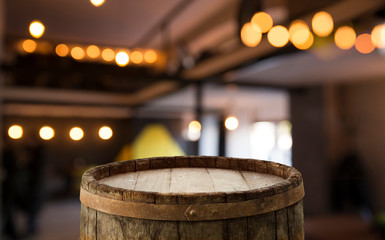 blurred background of bar and dark brown desk space of retro wood