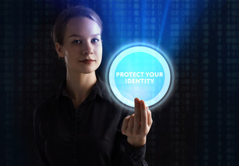 The concept of business, technology, the Internet and the network. A young entrepreneur working on a virtual screen of the future and sees the inscription: Protect your identity