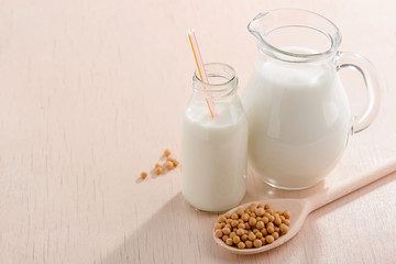 Bottle and jug of milk