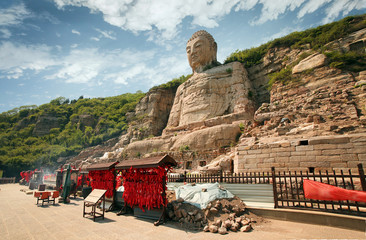Stone carving Mengshan Buddha. It was built in A.D. 551. The head was rebuilt in After A.D.2000....