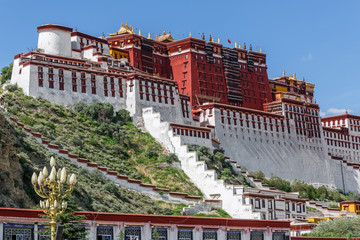 Fototapeta premium Side view on Potala Palace (Lhasa, Tibet, China. Nowadays, it is considered the most important architectural space of the Tibetan Buddhism,