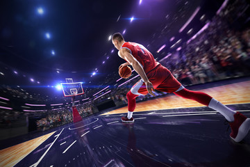 Basketball player make block shot in jump. around Arena with blue light spot