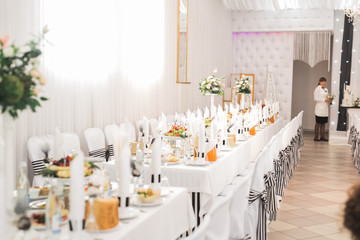 Interior of a restaurant prepared for wedding ceremony