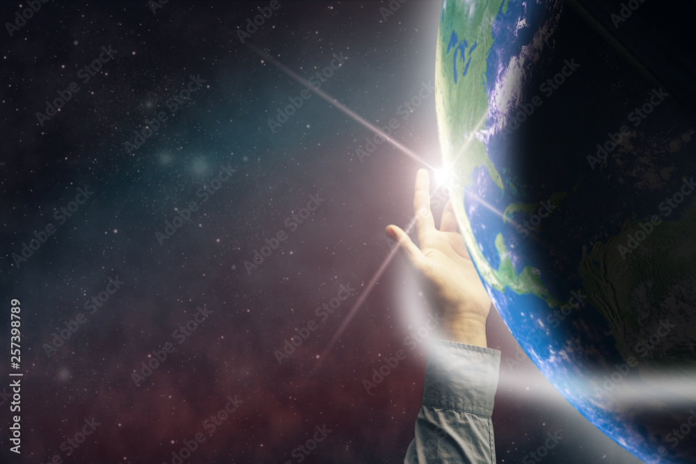 Leinwandbilder touching planet with finger. nebula dust in infinite space. mixed media.