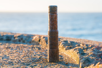 Rusty bolt. Place for mounting an artillery cannon.