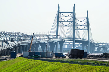 High-speed highway bypassing the city. City without traffic jams. Western high-speed diameter of St. Petersburg with a large cable-stayed bridge.