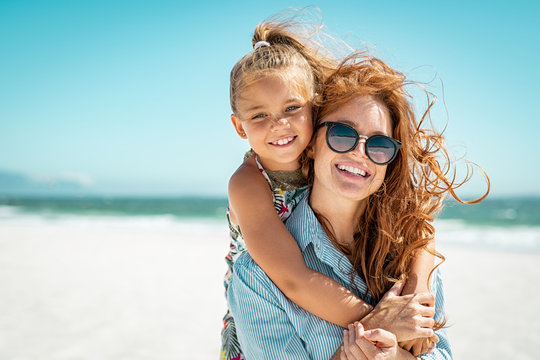 Mother with daughter at beach