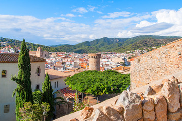 Fototapeta na wymiar Tossa de mar, Spain: Old Town with blue sky.