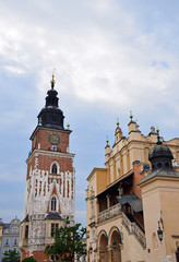 Fototapeta na wymiar Town Hall tower and Cloth Hall in Krakow, Poland
