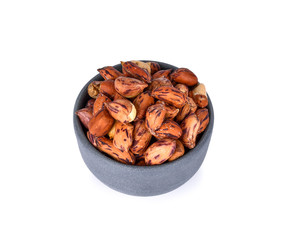 Nuts in bowl isolated on white background
