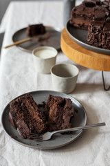 Slices of chocolate cake on table