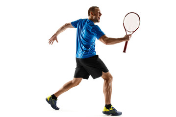 Portrait of a handsome male tennis player celebrating his success isolated on a white studio background. Human emotions, winner, sport, victory concept