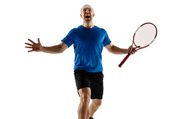 Portrait of a handsome male tennis player celebrating his success isolated on a white studio background. Human emotions, winner, sport, victory concept