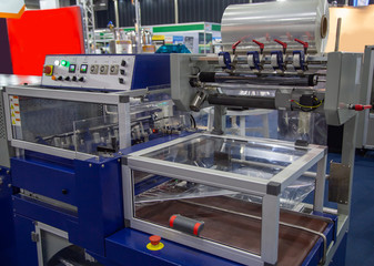 Film wrapping package machine for carton, box and cardboard