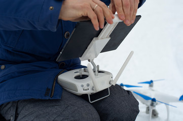 Man preparing for starting with drone.