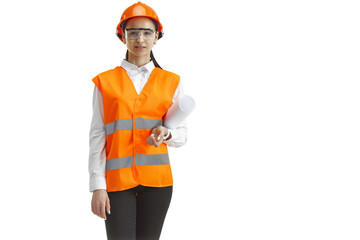 Destroying gender stereotypes. Female builder in orange helmet standing on white studio background. Safety specialist, engineer, occupation, businesswoman, job concept. Woman in the male profession