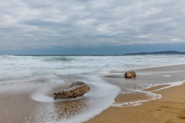 Sea Storm and cloudy sky. Spring morning on the beach. Spring weather. 