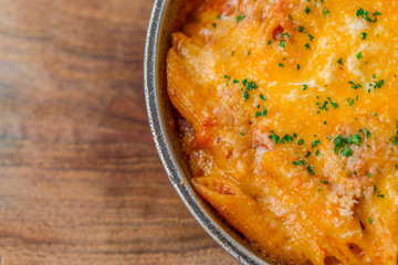 Mac and cheese. Macaroni and cheese with meat tomato sauce. Delicious lunch