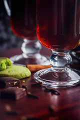 Mulled Wine with pistachio cookies, orange and dark chocolate