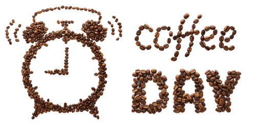 Ringing alarm clock and phrase Coffee Day made of coffee beans.