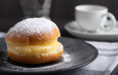 Berlin donuts with coffee in the background