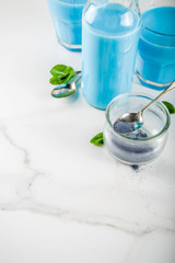 Plant based drink, blue matcha smoothie, vegan trendy beverage from the dried butterfly pea flowers