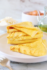 Pancakes (blinis) without flour and ingredients: cream cheese, olive oil and eggs