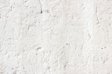 Old grunge dirty cracked vintage light grey concrete and cement mold texture wall or floor background with weathered paint and scratches