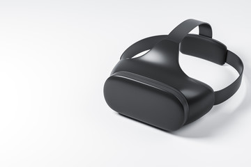 Top side view of the black vr headset on the white background  with copy space.