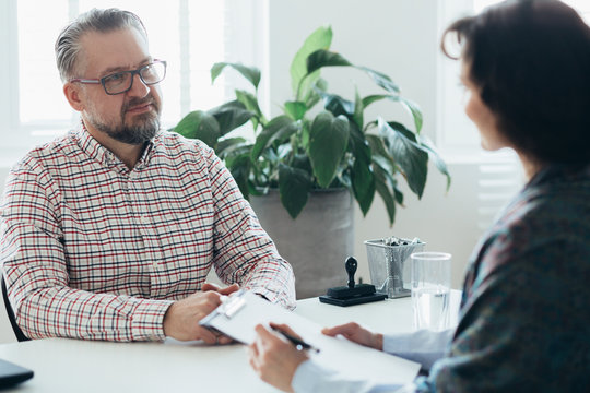 Young Successful Man Struggling With Work Problems