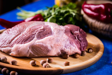 Raw pork on a wooden board