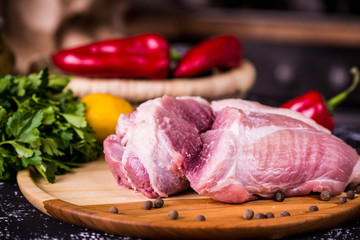 Raw pork on a wooden board