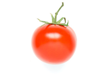 Bright red ripe tomato isolated on white background