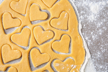 Preparing of tasty cookies on grey background