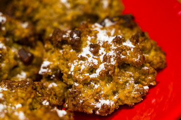 homemade oatmeal cookies with coconut, dates and powdered sugar