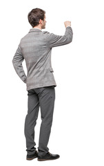 back view of writing business man in suit.