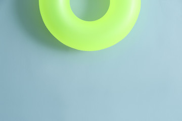 Inflatable ring on color background