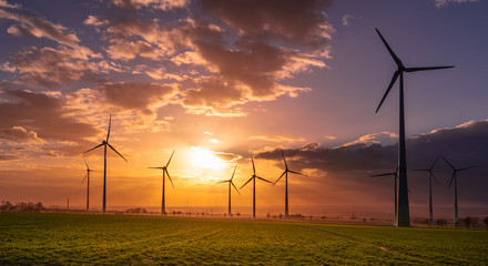 Sunset with wind turbines - obrazy, fototapety, plakaty