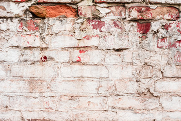 Texture, brick, wall, it can be used as a background . Brick texture with scratches and cracks
