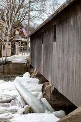 Ice Shoves Along Side Covered Bridge