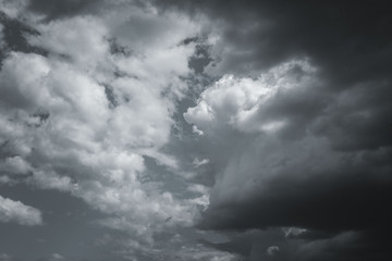 Storm clouds in the sky over the city. Gray gloomy sky before hurricane