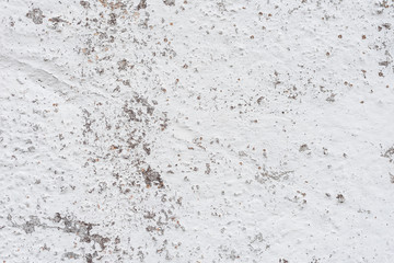 Wall fragment with scratches and cracks