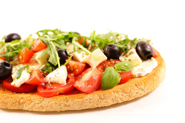 bruschetta with tomato, mozzarella and basil isolated on white background