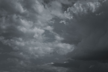 Storm clouds in the sky over the city. Gray gloomy sky before hurricane
