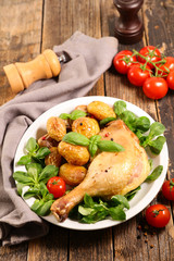 grilled duck leg with lettuce and potato