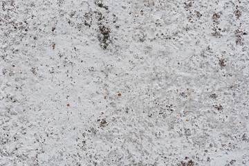 Wall fragment with scratches and cracks