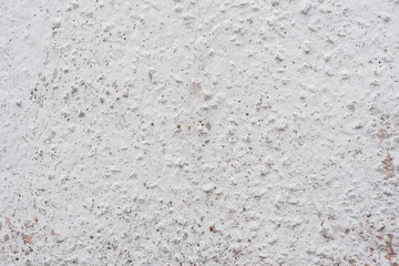 Wall fragment with scratches and cracks